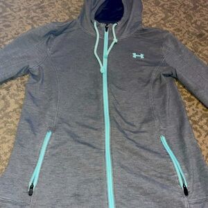 Hi I am selling this under armor zip up jacket.